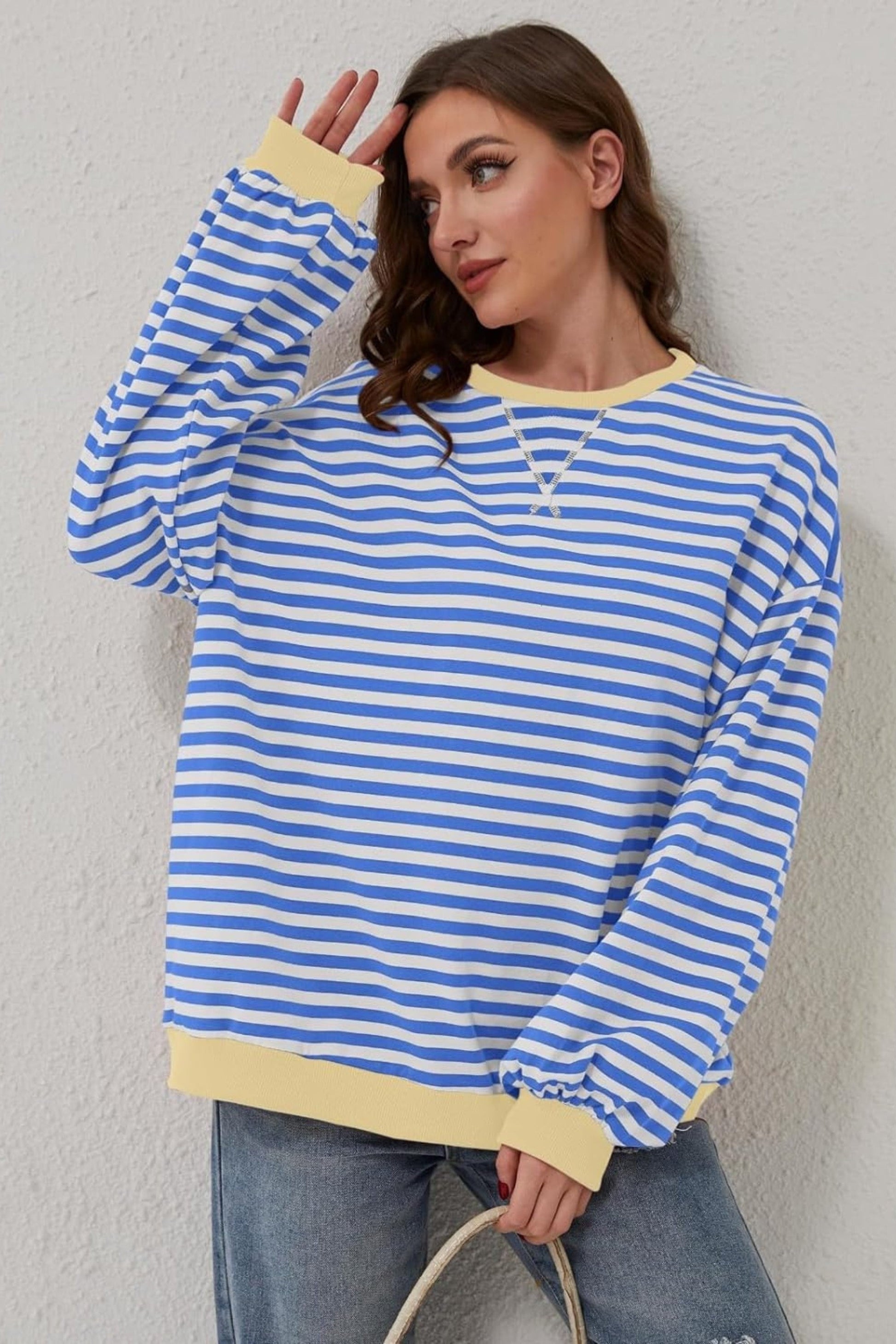 celine-stripe-jumper-2_3aed100d-41a0-4ab7-a99e-9aa8aec23e41.jpg